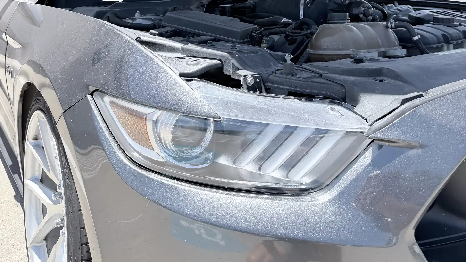 Restored crystal-clear headlight on a Ford Mustang after mobile headlight restoration in Kaufman County, TX