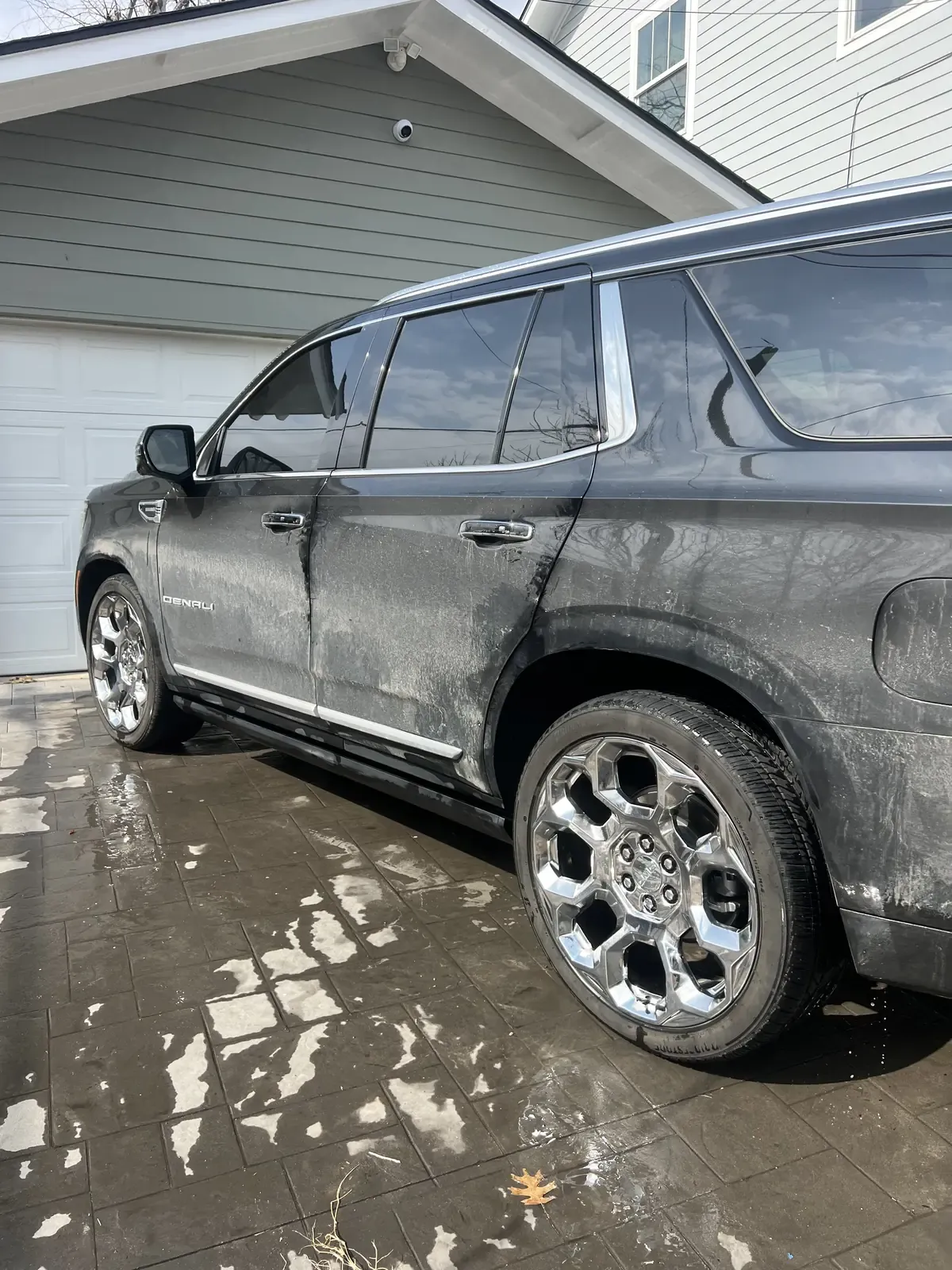 Dirty GMC Yukon Denali covered in road grime before full detail service in Kaufman County, TX