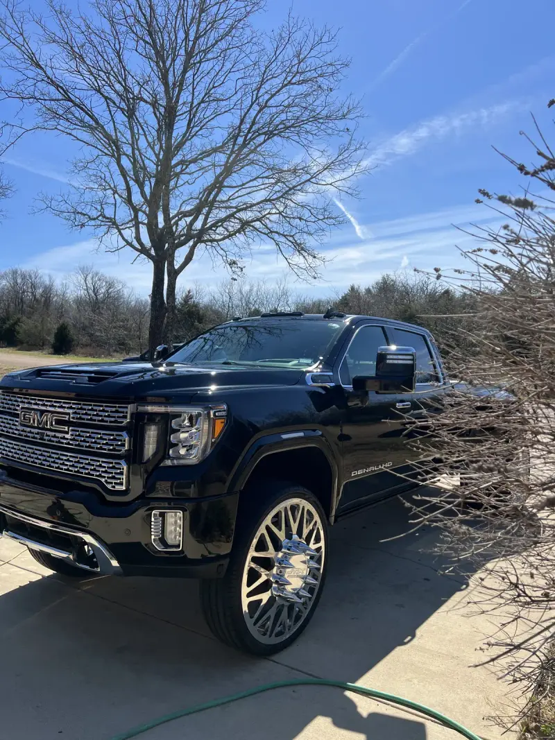 Lifted GMC Sierra Denali HD dually after mobile detailing in North Texas