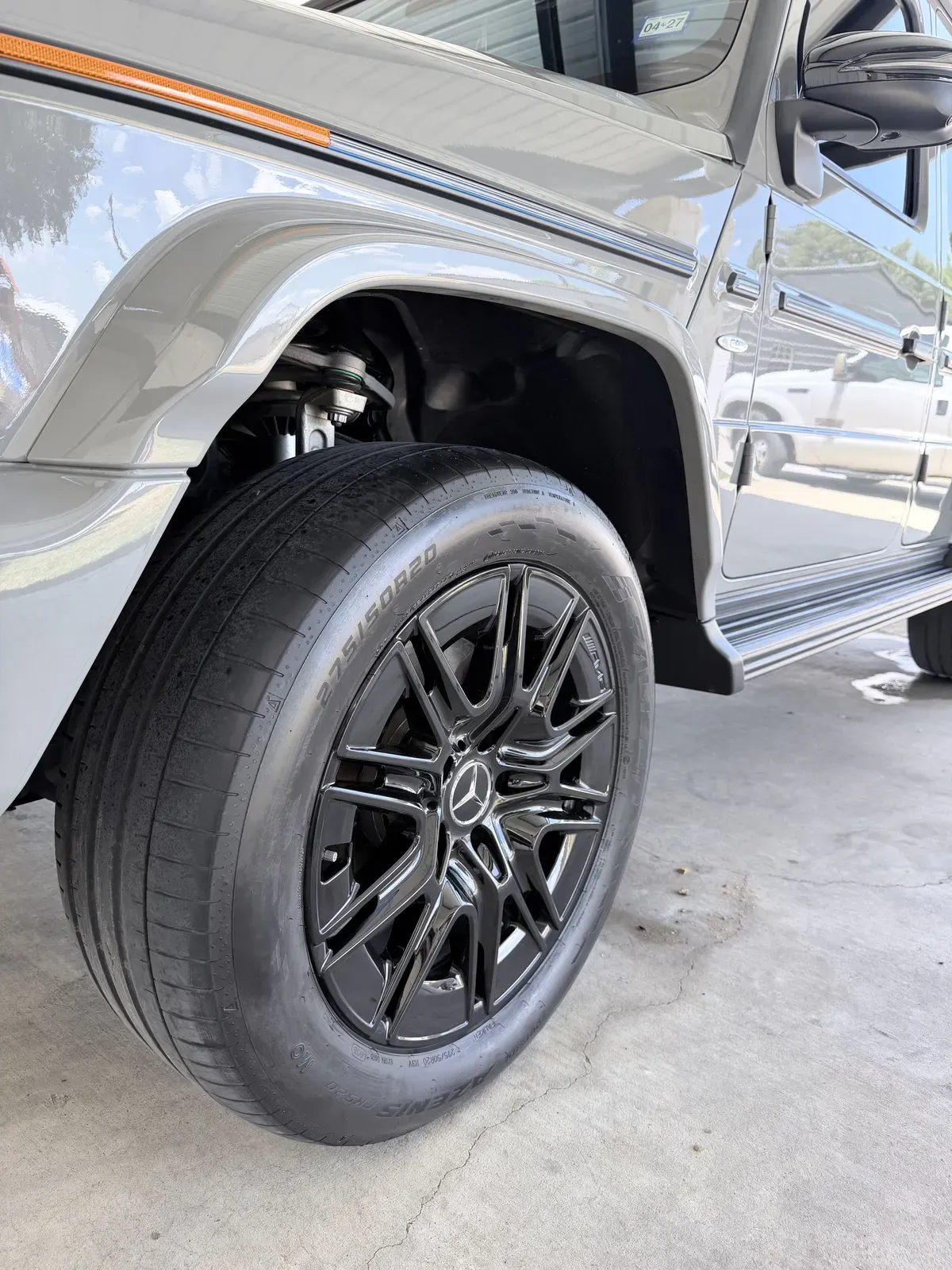 Spotless Mercedes G-Class wheel and dressed tire after a wheel and tire detail