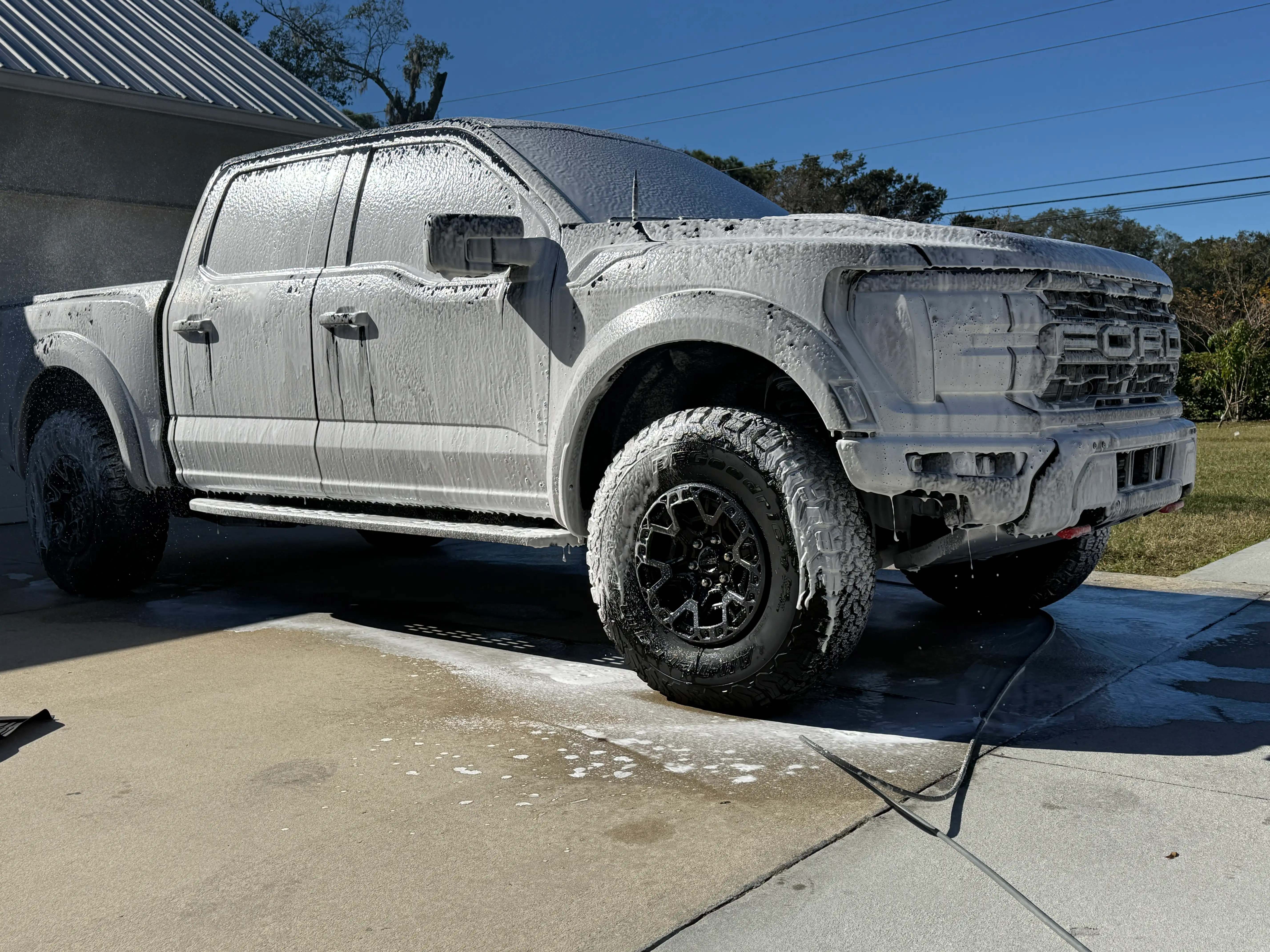Full-size truck being detailed in a Kaufman County driveway