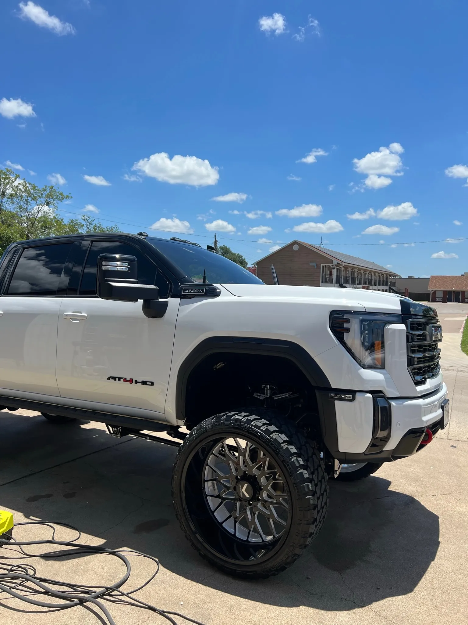 Exterior car detailing in progress in a Kaufman County driveway