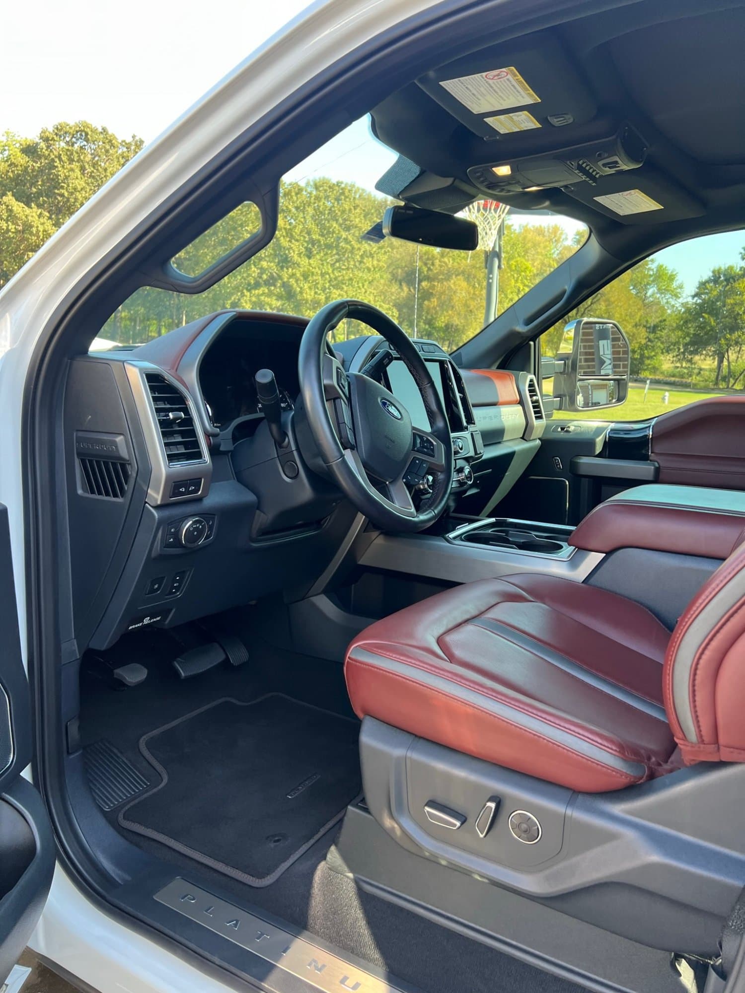 Ford Platinum truck interior detail with red leather